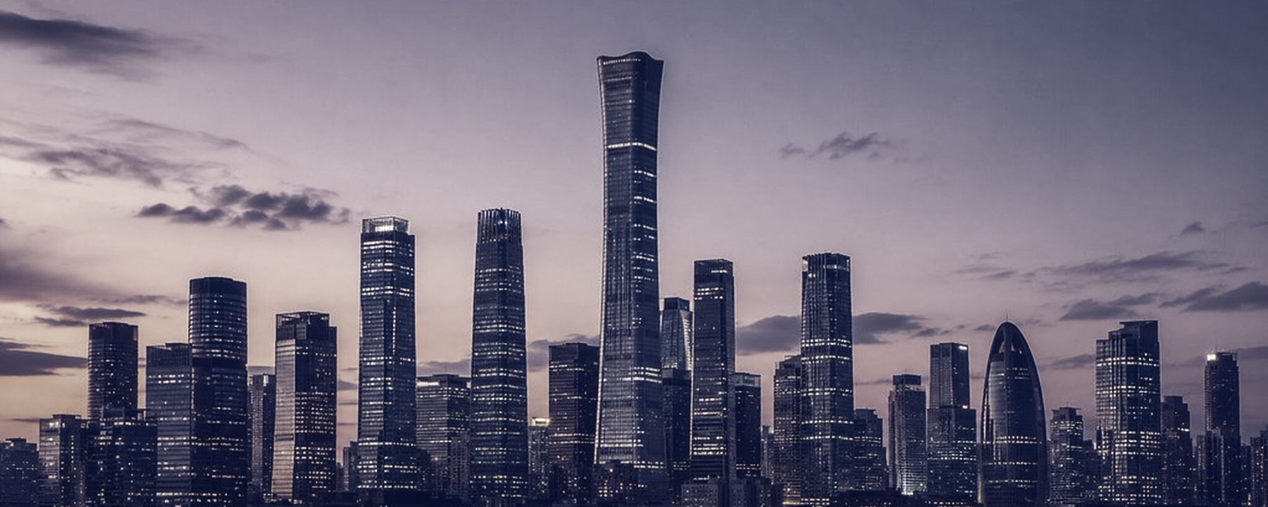 A city skyline at dusk